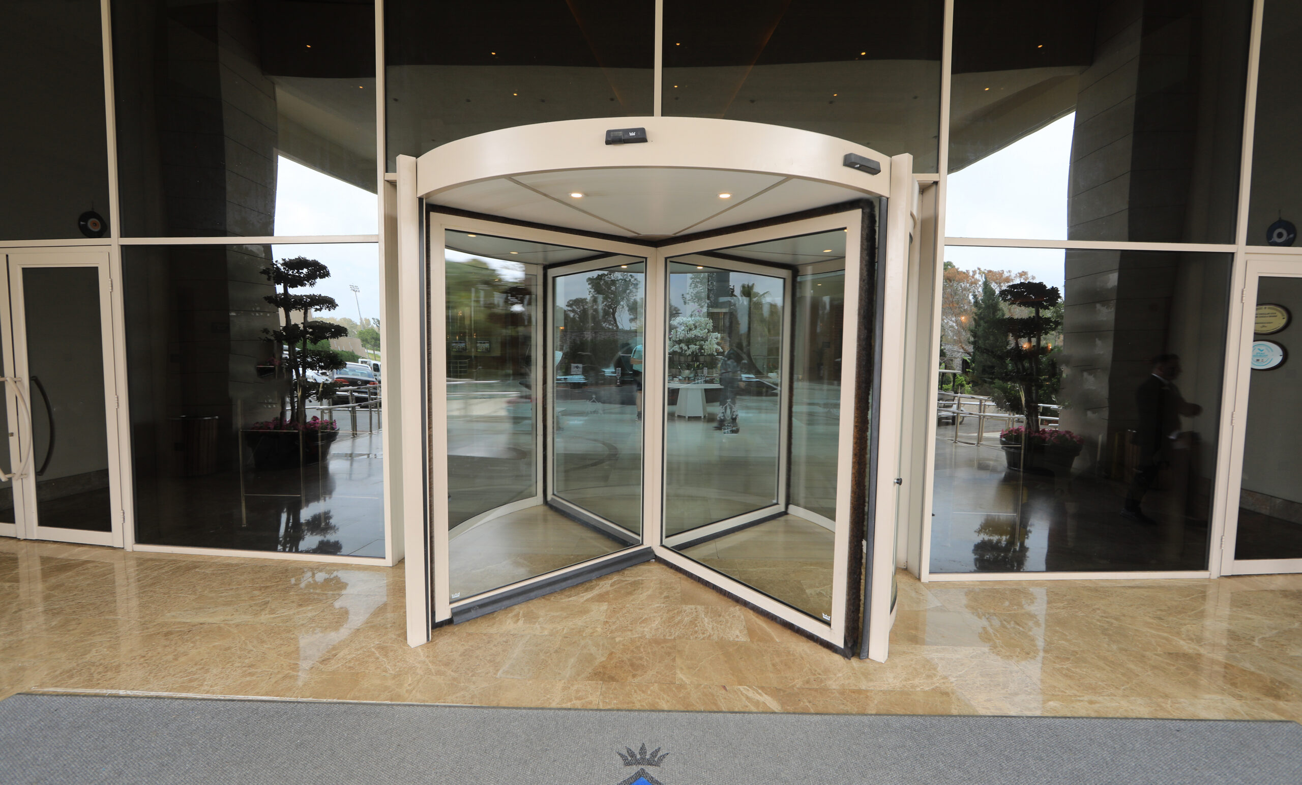 modern-revolving-hotel-office-building-entrance